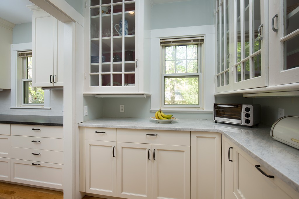 7 Homestead Road Wellesley, MA 02482 - Photo 6 of 10 a kitchen with cabinets appliances and a window