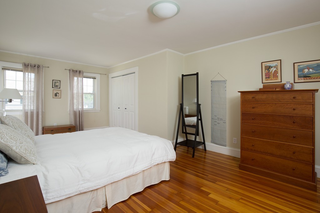 7 Homestead Road Wellesley, MA 02482 - Photo 7 of 10 a bedroom with a bed and a dresser