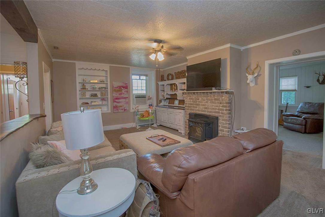 3624 Winchester Road Allentown, PA 18104 - Photo 10 of 17 Family room with fireplace.
