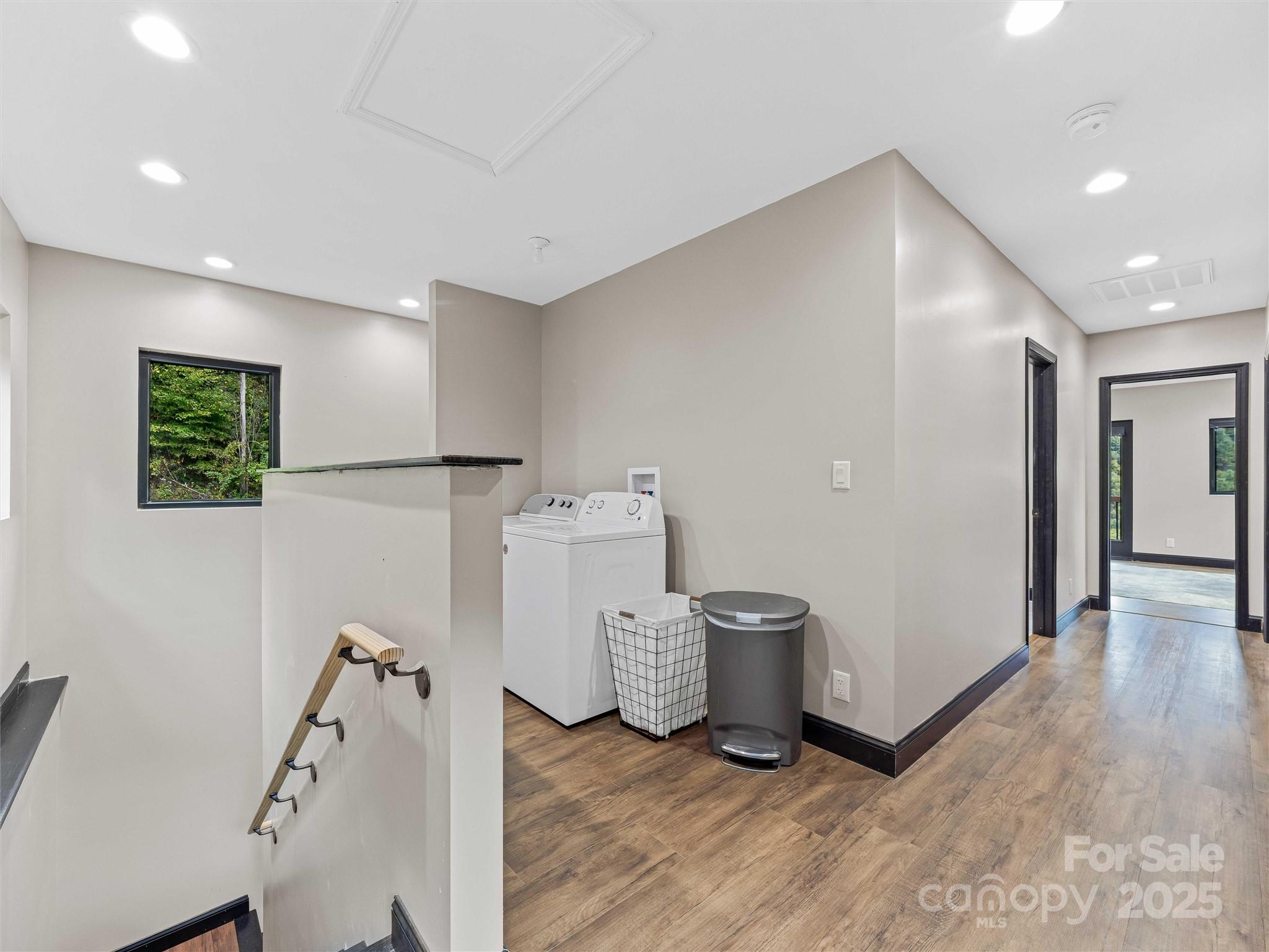 945 Roaring Fork Road Hot Springs, NC 28743 - Photo 13 of 48 a view of a storage & utility room with two washing machine