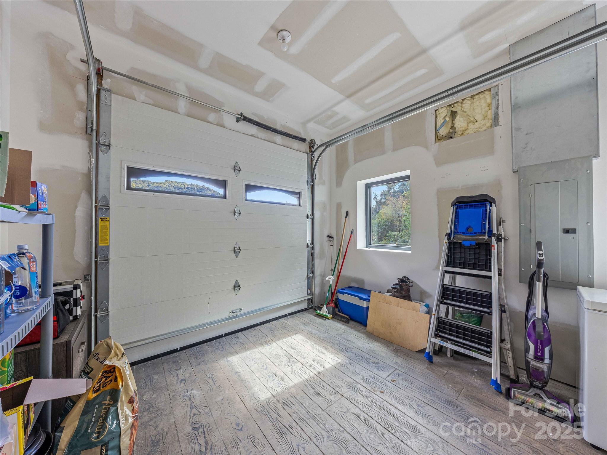945 Roaring Fork Road Hot Springs, NC 28743 - Photo 19 of 48 a view of a hallway with workspace and a window