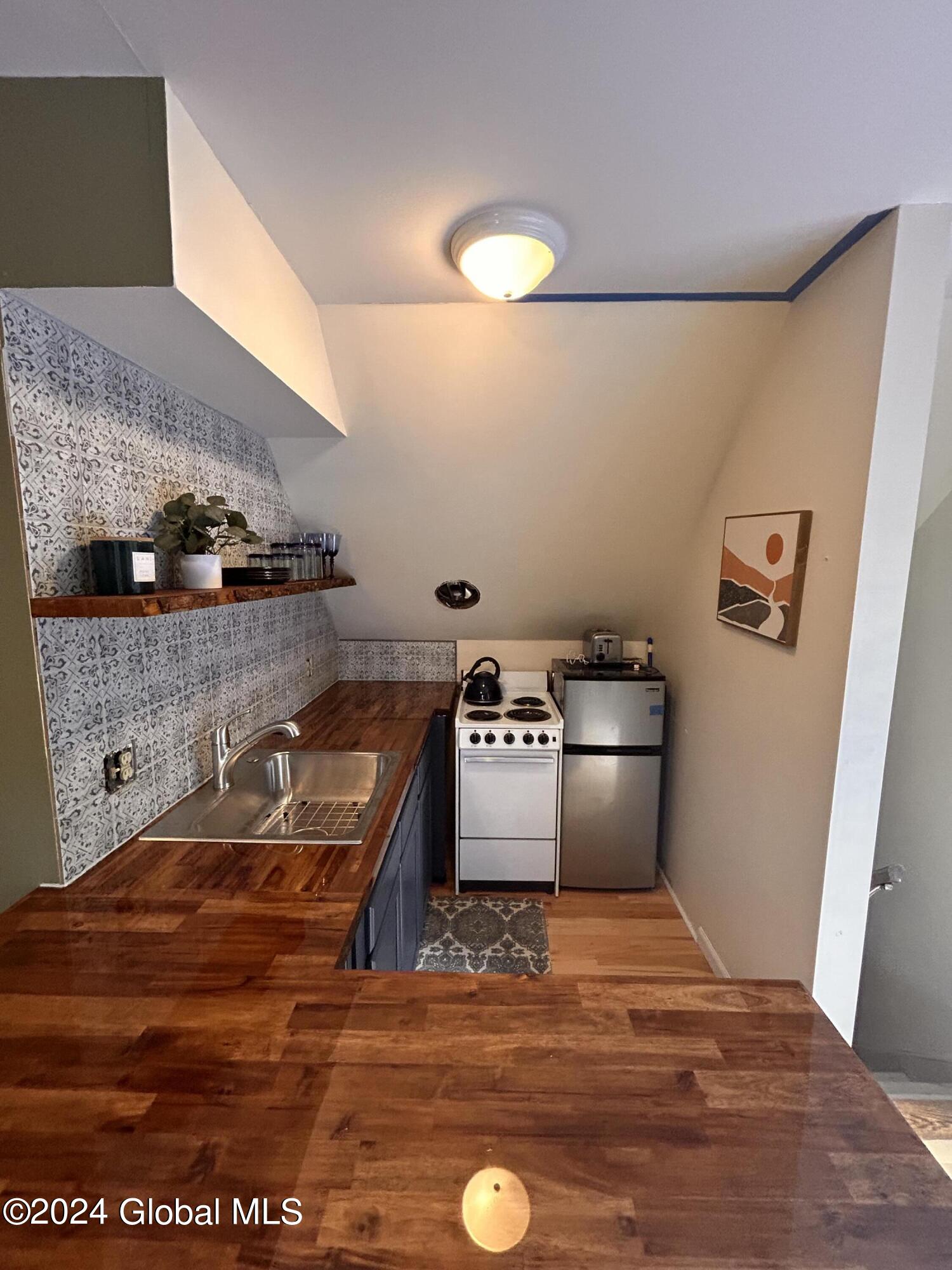 148 Ruggles Road, Unit 1 Wilton, NY 12866 - Photo 9 of 15 Photo Jun 27 2023, 5 20 58 PM