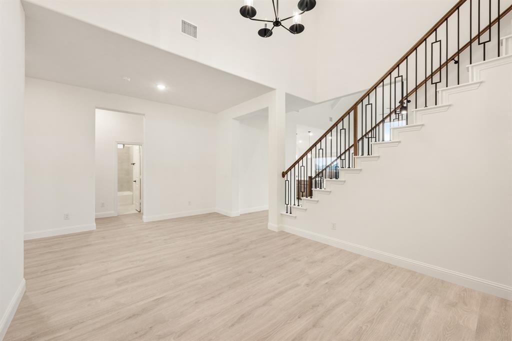 2824 Spg Vly Way Anna, TX 75409 - Photo 12 of 40 a view of an entryway with wooden floor