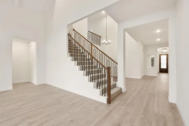 a view of entryway with wooden floor