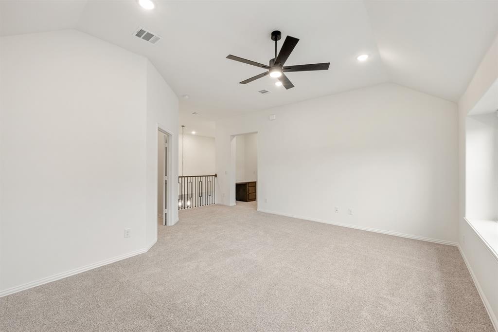 2824 Spg Vly Way Anna, TX 75409 - Photo 32 of 40 a view of a livingroom with a ceiling fan and window