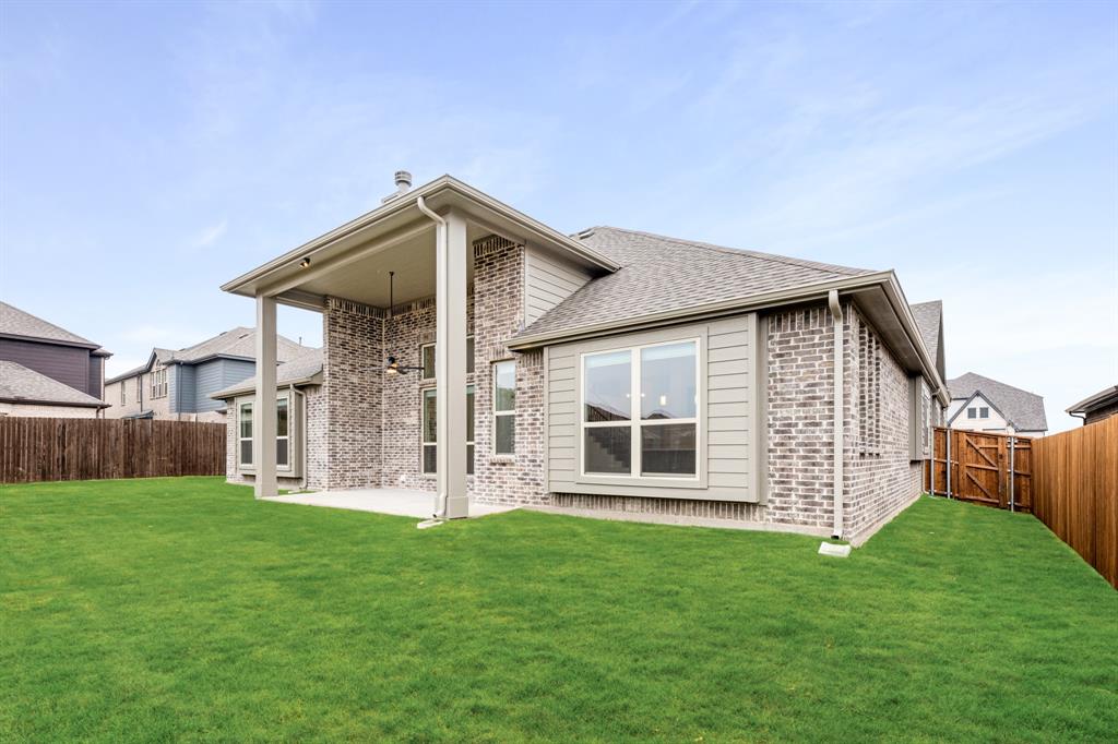 2824 Spg Vly Way Anna, TX 75409 - Photo 39 of 40 a view of a house with a yard and porch