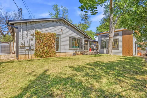 a front view of house with yard