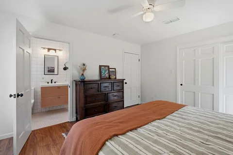 a living room with furniture a fireplace and a table