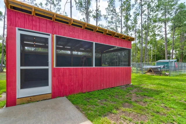 a view of swimming pool with a yard