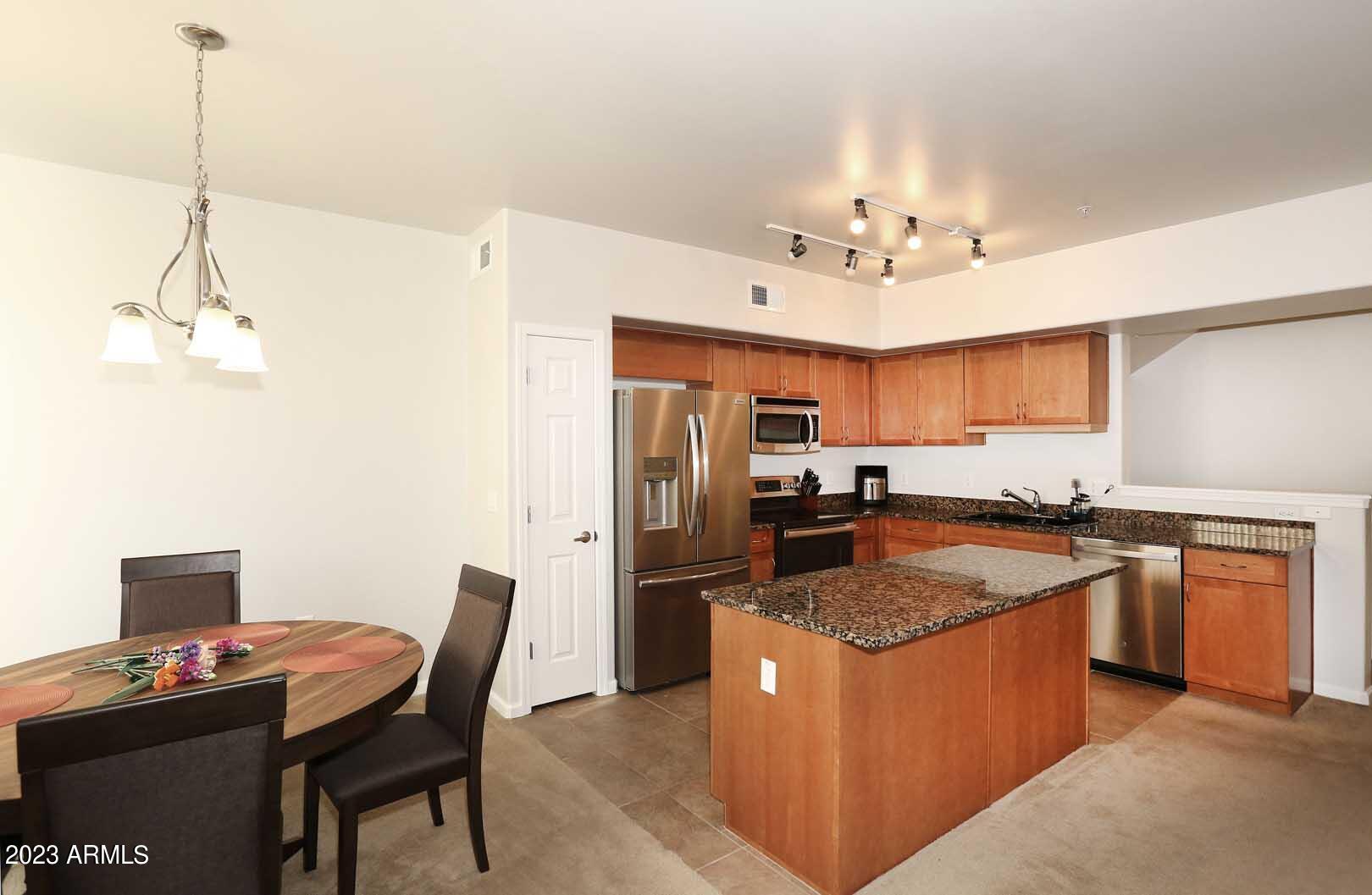 1920 East Bell Road, Unit 1134 Phoenix, AZ 85022 - Photo 3 of 26 Dining Room-Kitchen