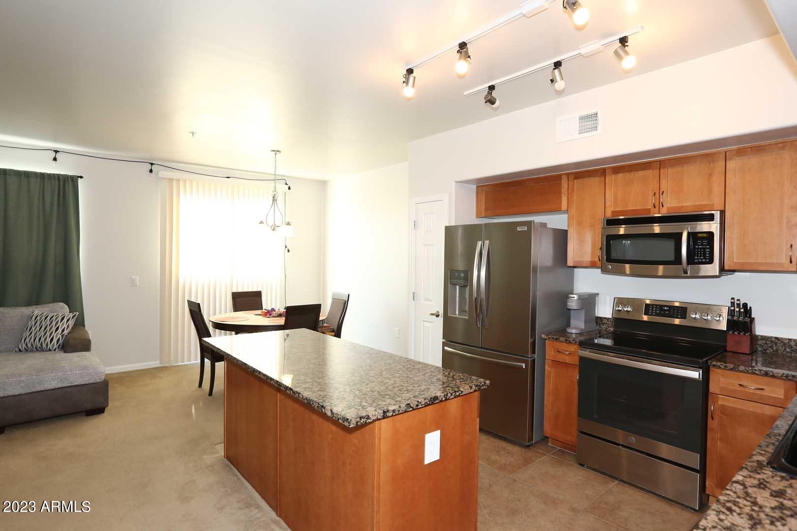 1920 East Bell Road, Unit 1134 Phoenix, AZ 85022 - Photo 5 of 26 Kitchen-Island Bar