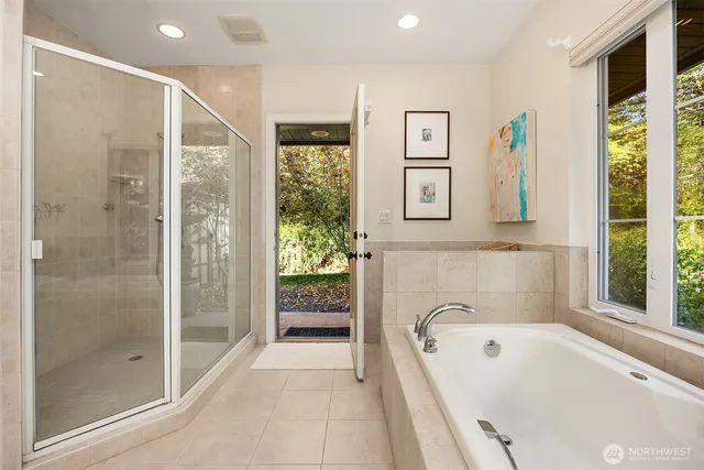 a kitchen with a sink appliances and cabinets