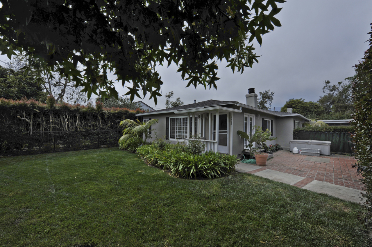 1368-1370 Virginia Road Montecito, CA 93108 - Photo 1 of 13 a front view of a house with garden