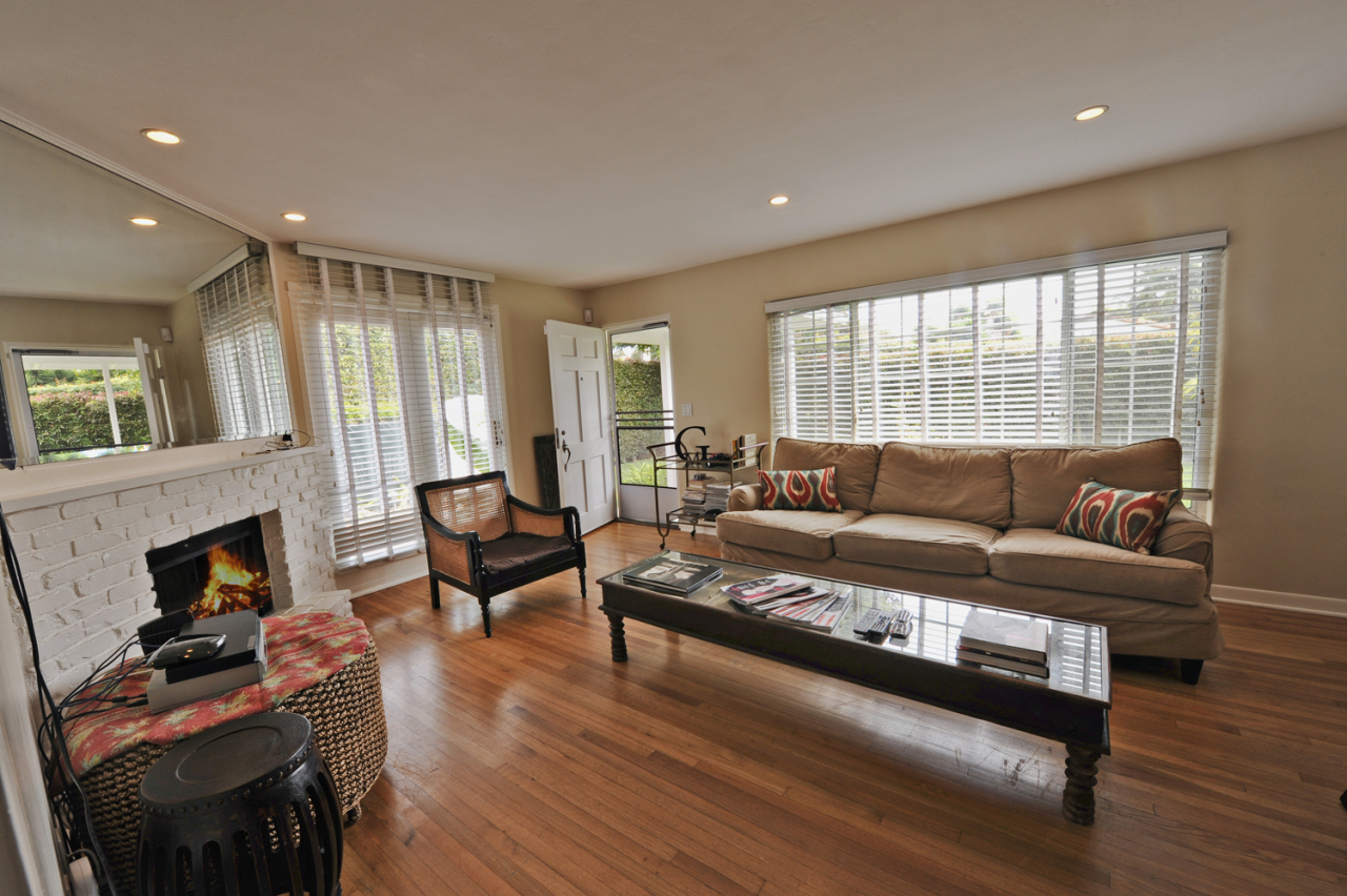 1368-1370 Virginia Road Montecito, CA 93108 - Photo 2 of 13 a living room with furniture and a fireplace