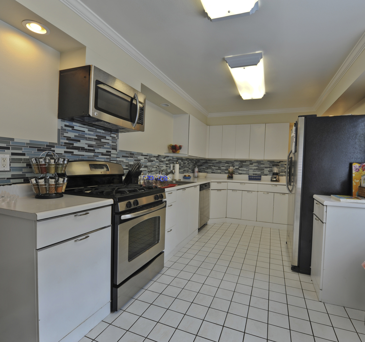 1368-1370 Virginia Road Montecito, CA 93108 - Photo 4 of 13 a kitchen with a sink stainless steel appliances and cabinets