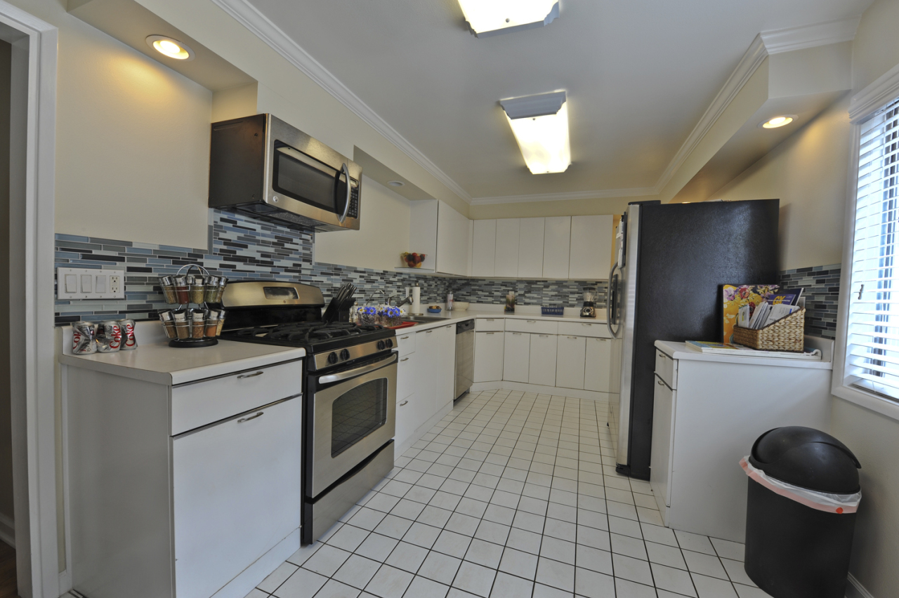 1368-1370 Virginia Road Montecito, CA 93108 - Photo 9 of 13 a kitchen with a sink cabinets and stainless steel appliances