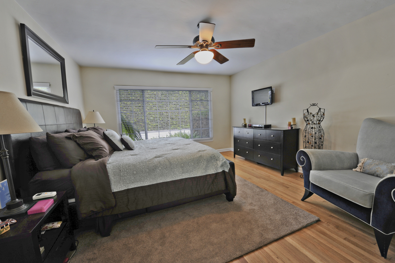 1368-1370 Virginia Road Montecito, CA 93108 - Photo 10 of 13 a bedroom with a bed couch and window