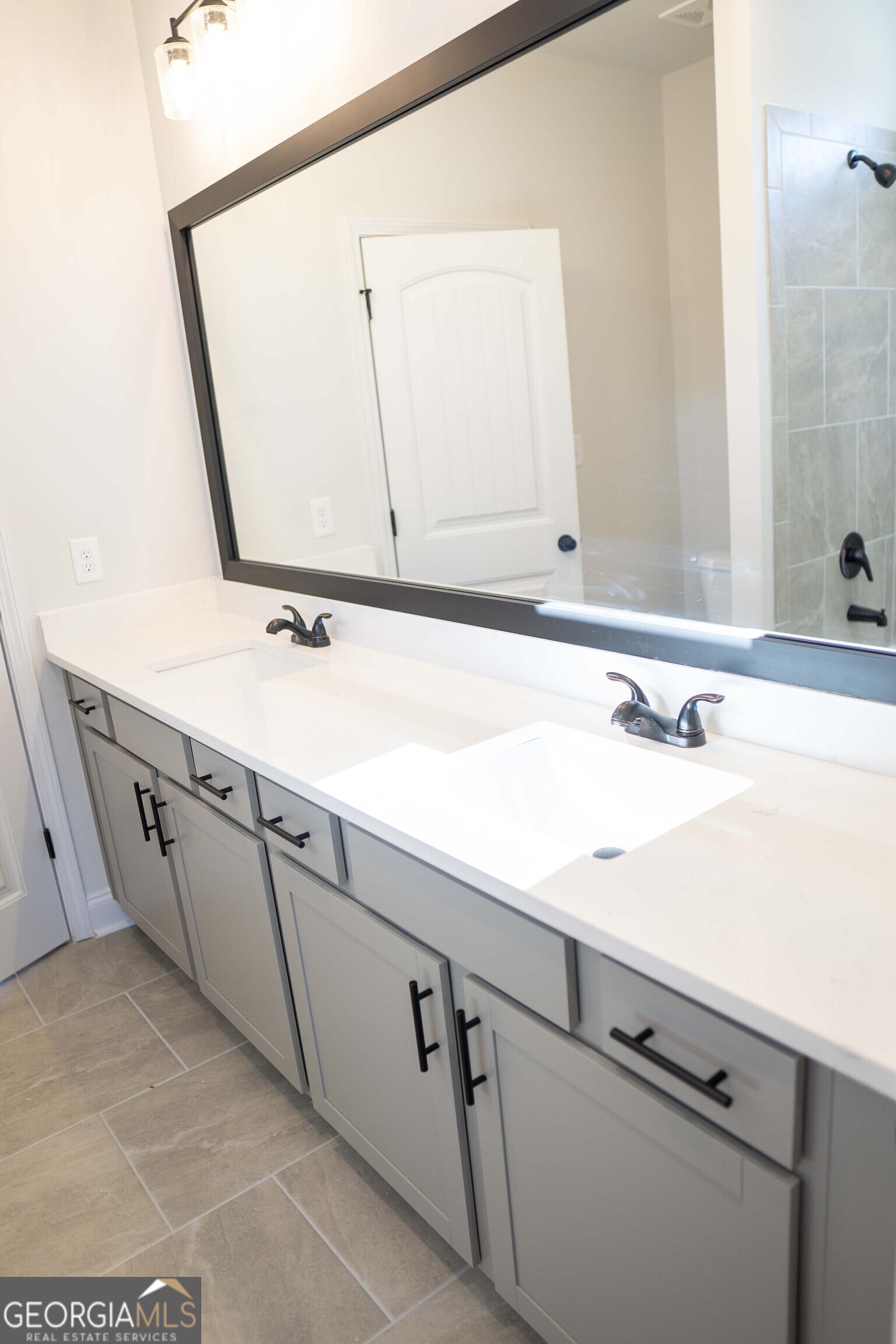 600 Beaver Court Perry, GA 31069 - Photo 41 of 48 a bathroom with a sink and a mirror