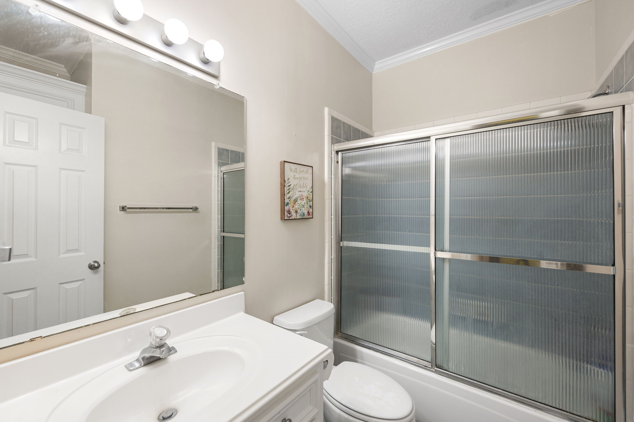 7202 North Fawn River Circle Spring, TX 77379 - Photo 18 of 23 a bathroom with a sink and a mirror