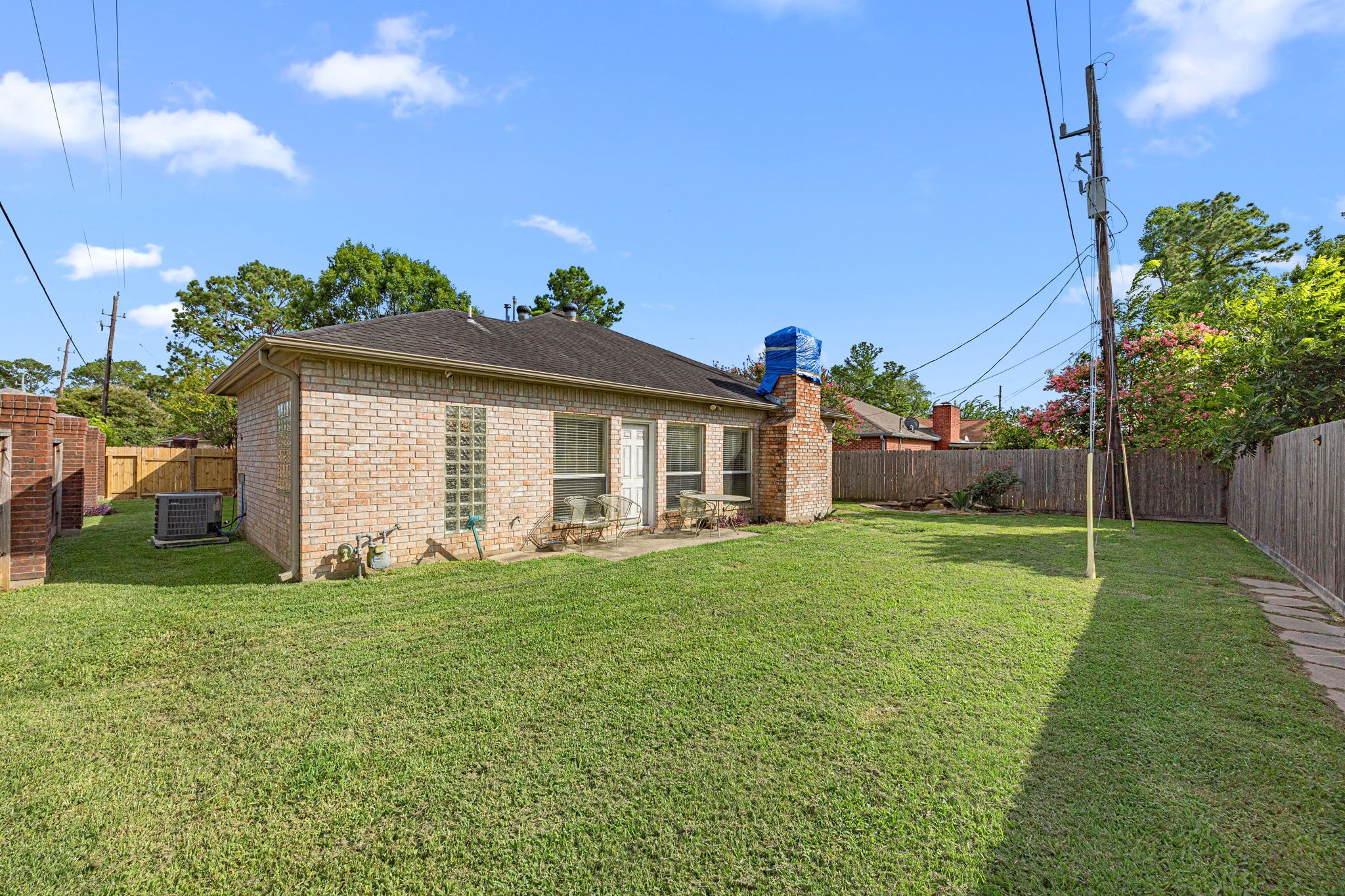 7202 North Fawn River Circle Spring, TX 77379 - Photo 22 of 23 a view of a house with backyard and garden