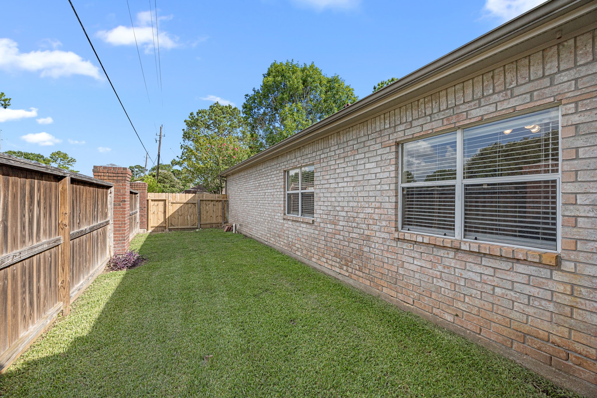 7202 North Fawn River Circle Spring, TX 77379 - Photo 23 of 23 a view of a backyard with plants