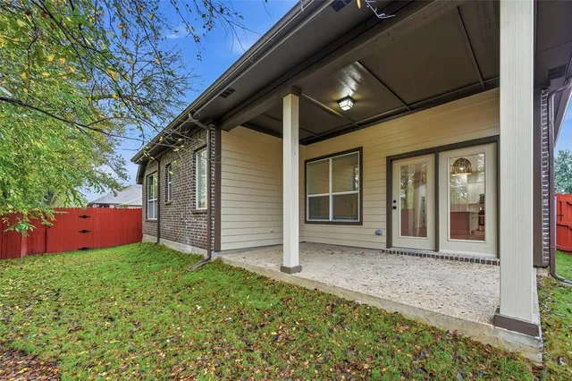 front view of a house with yard