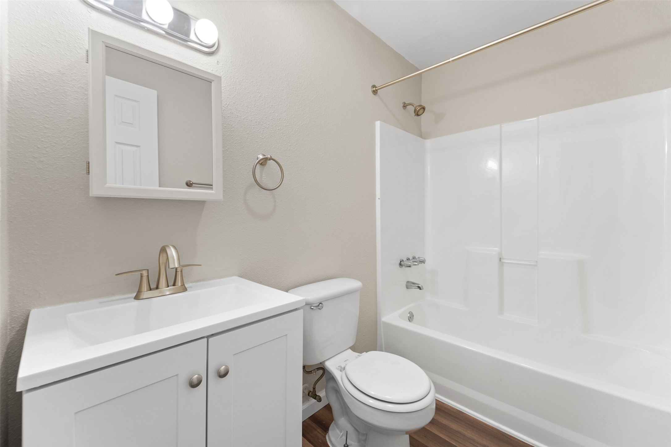 512 Hollyhock Street, Unit 24 Prairie View, TX 77484 - Photo 11 of 12 a bathroom with a sink a toilet and shower