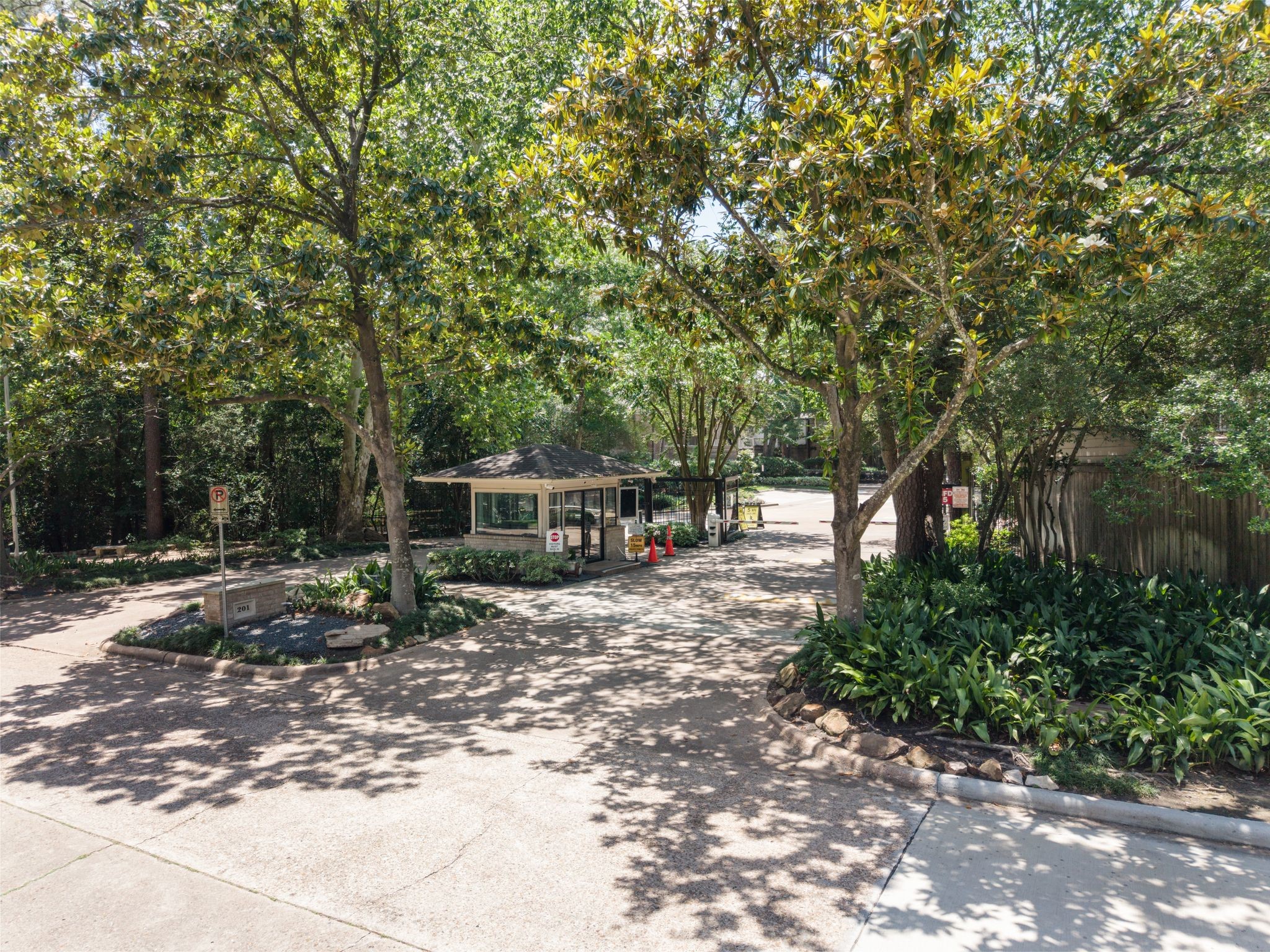 201 Vanderpool Lane, Unit 137 Houston, TX 77024 - Photo 35 of 42 A manned attendant welcomes you into the gated Woodstone community, a peaceful wooded retreat tucked in the heart of Memorial. Surrounded by mature trees and lush landscaping, the neighborhood offers a rare sense of privacy and tranquility while still being moments from everything.