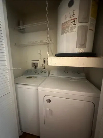 a stove top oven sitting inside of a kitchen