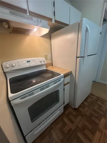 a close view of sink and stove