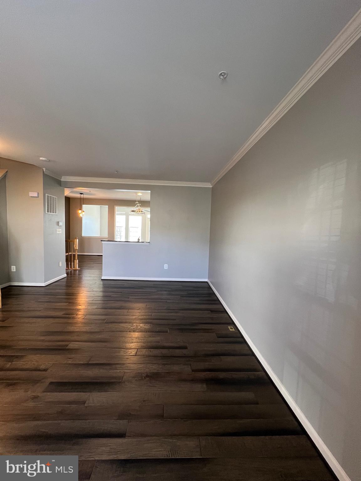131 Fiona Way Brunswick, MD 21758 - Photo 17 of 73 a view of wooden floor and staircase