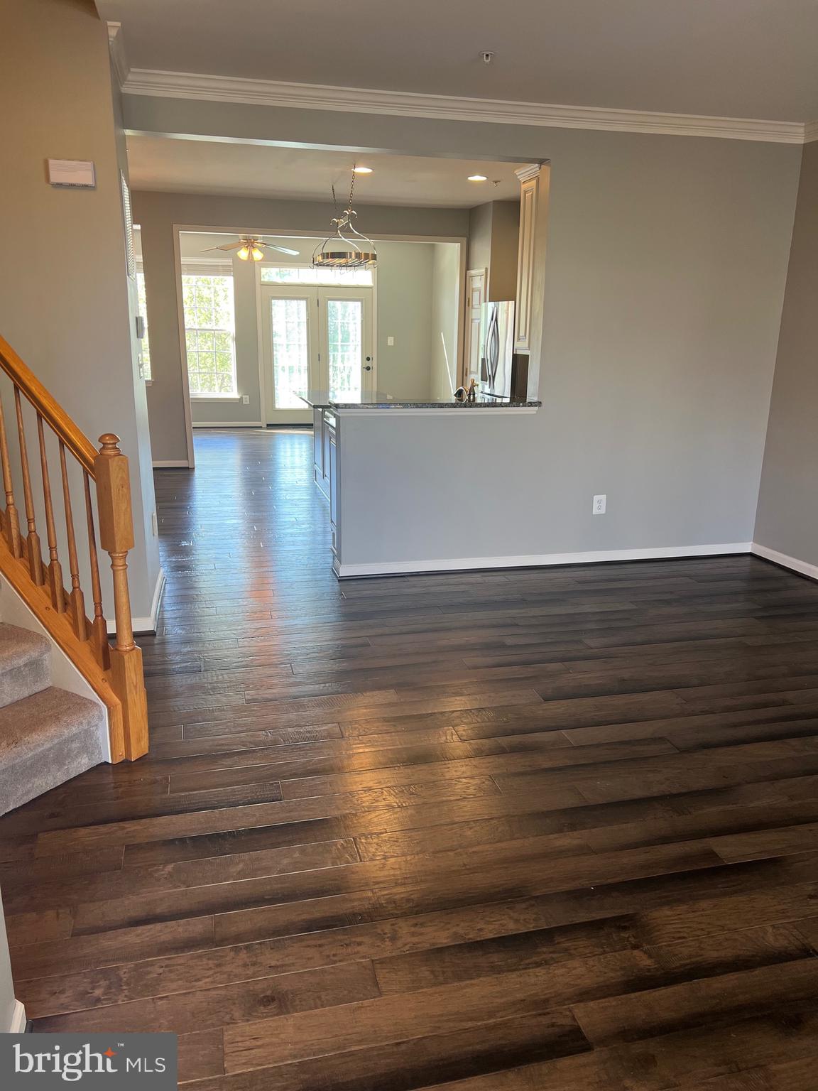 131 Fiona Way Brunswick, MD 21758 - Photo 19 of 73 wooden floor in an empty room with a window