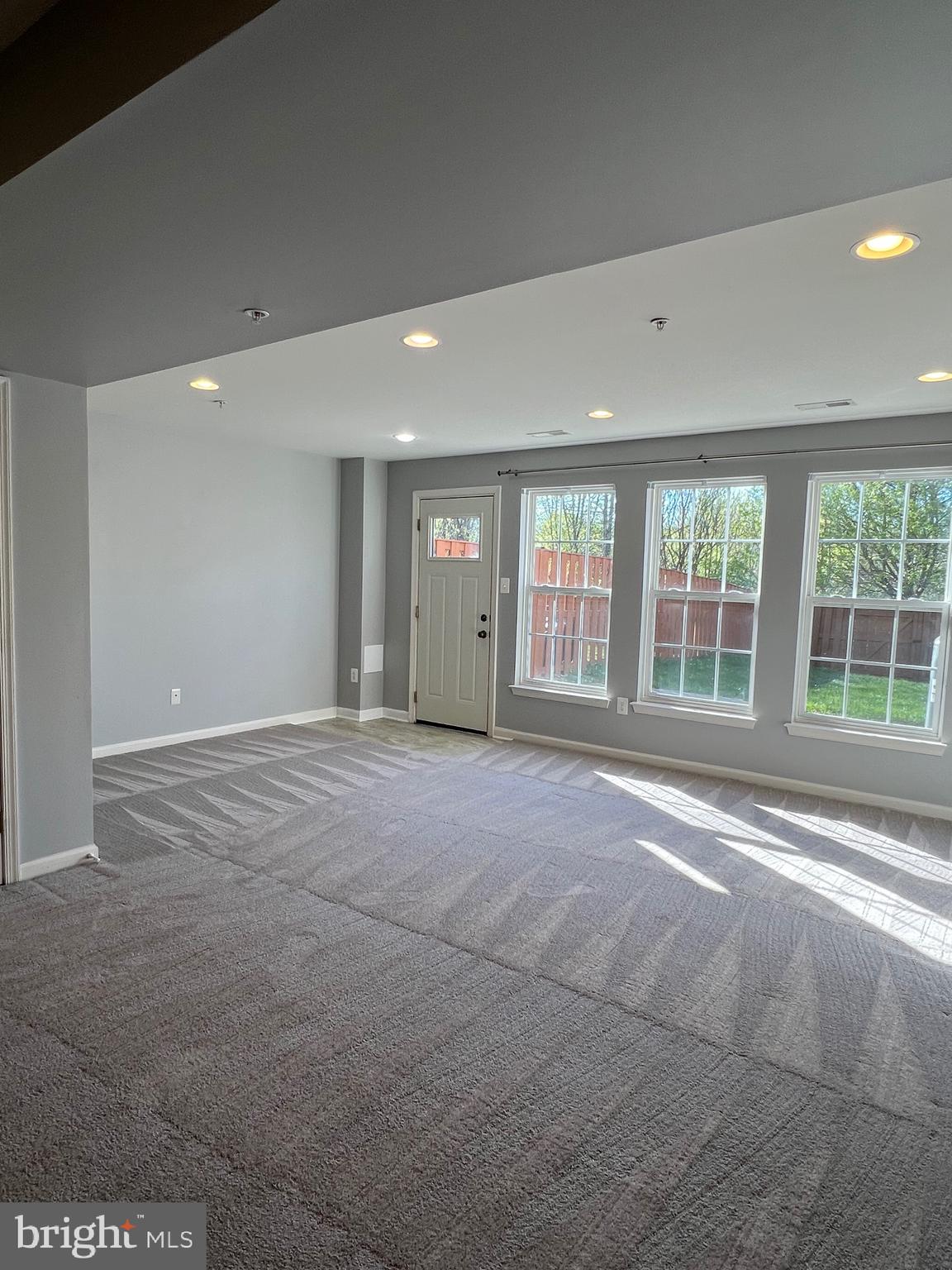 131 Fiona Way Brunswick, MD 21758 - Photo 40 of 73 a view of an empty room with a window
