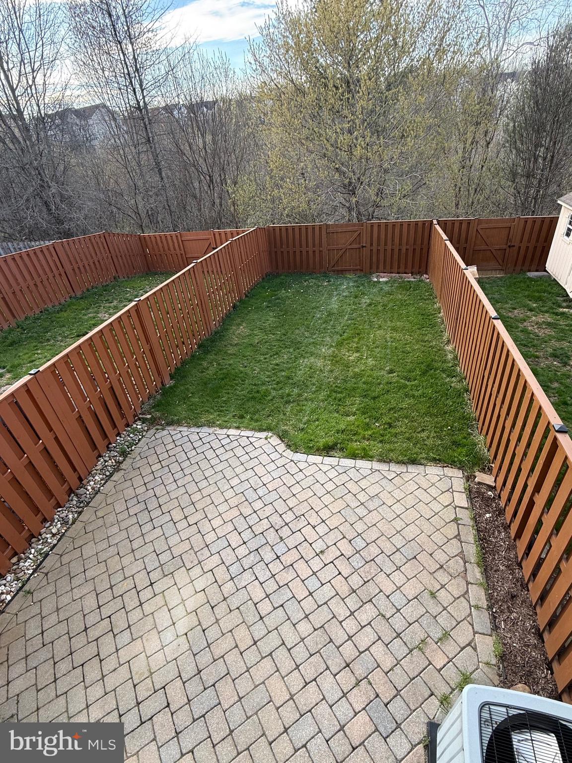 131 Fiona Way Brunswick, MD 21758 - Photo 41 of 73 a view of a yard with wooden fence