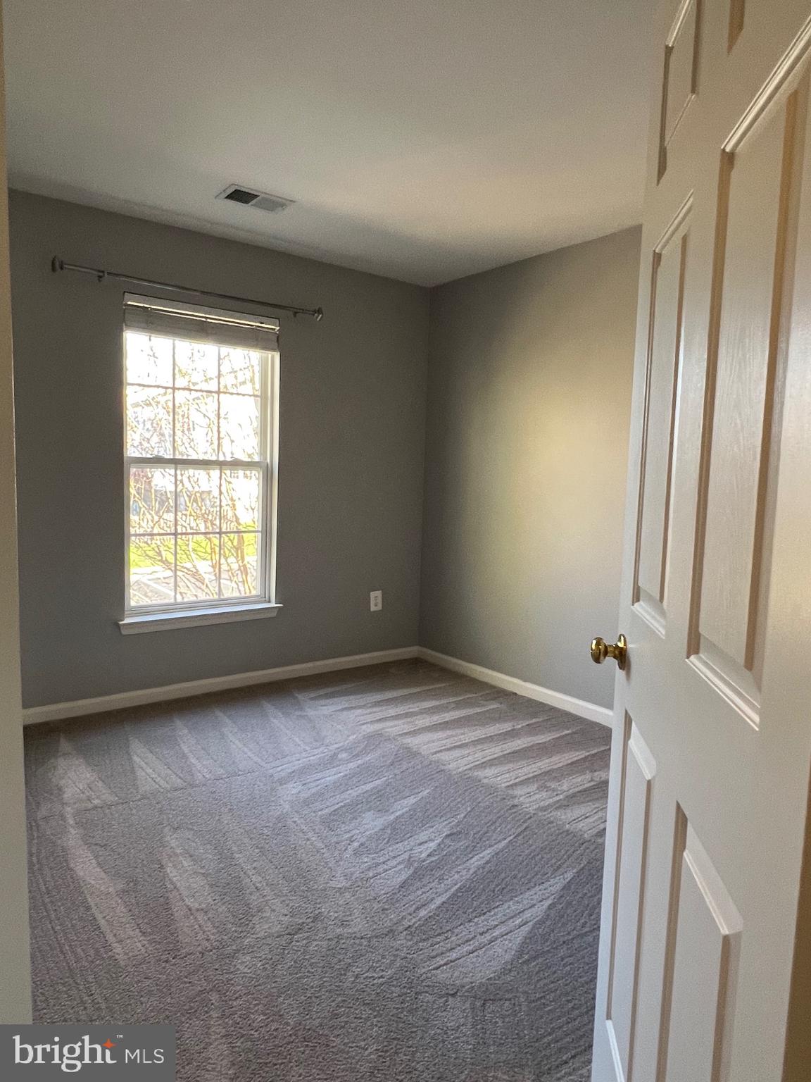 131 Fiona Way Brunswick, MD 21758 - Photo 67 of 73 a view of an empty room with a window