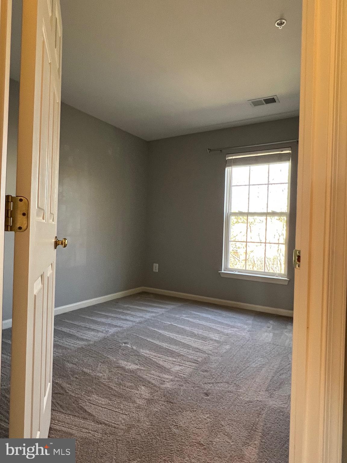 131 Fiona Way Brunswick, MD 21758 - Photo 71 of 73 a view of an empty room with a window