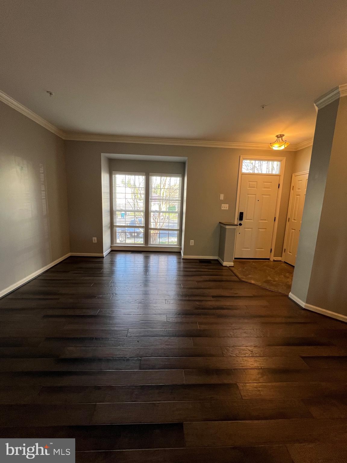 131 Fiona Way Brunswick, MD 21758 - Photo 10 of 73 a view of empty room with wooden floor