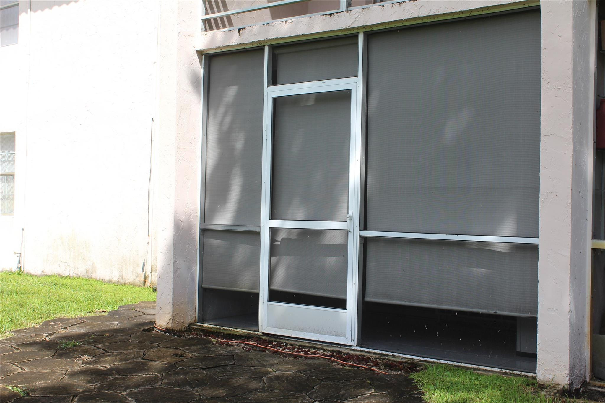 7610 Stirling Road, Unit E102 Hollywood, FL 33024 - Photo 11 of 13 Back entrance (Balcony)