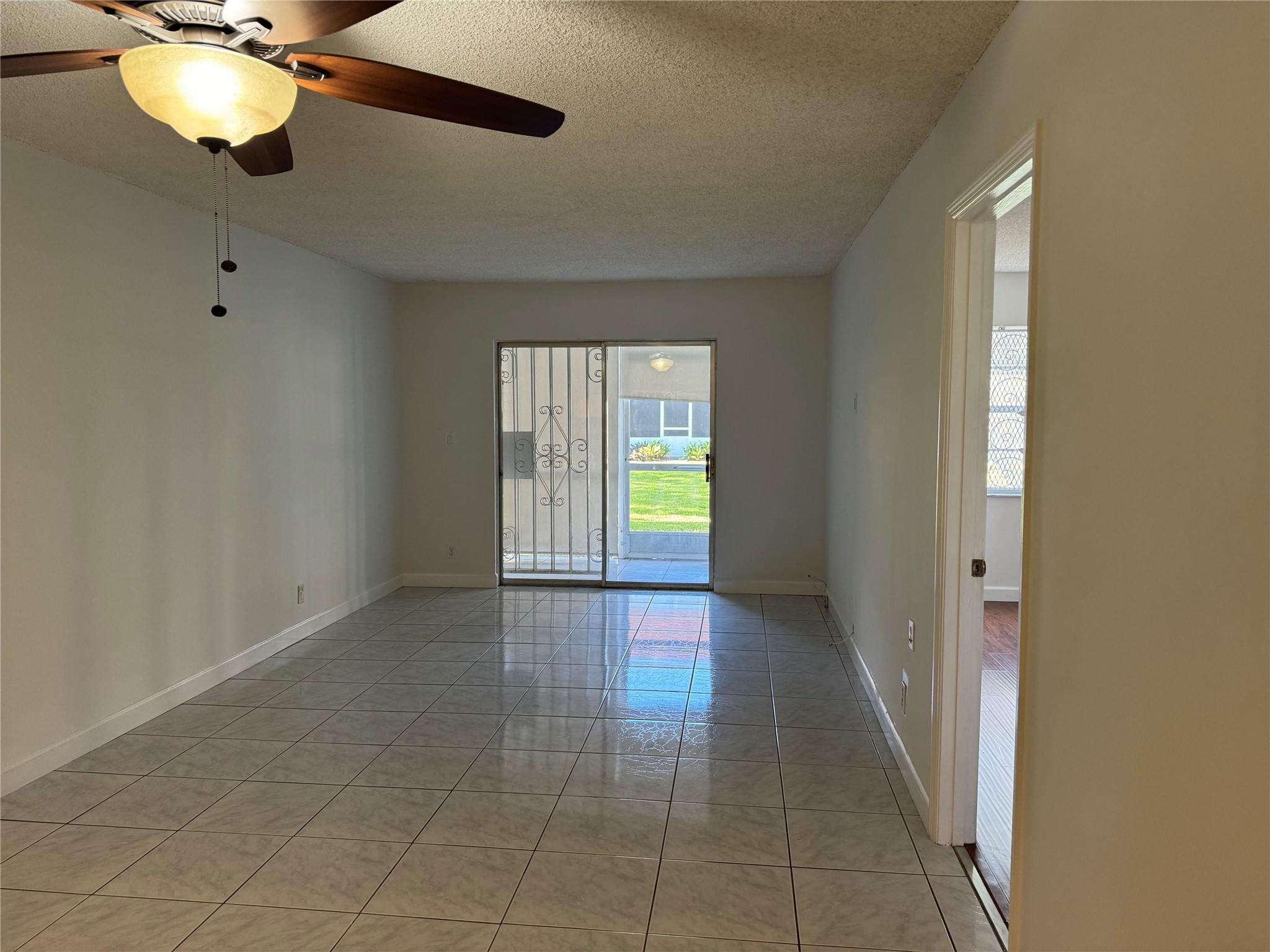7610 Stirling Road, Unit E102 Hollywood, FL 33024 - Photo 5 of 13 Living-Dining Room