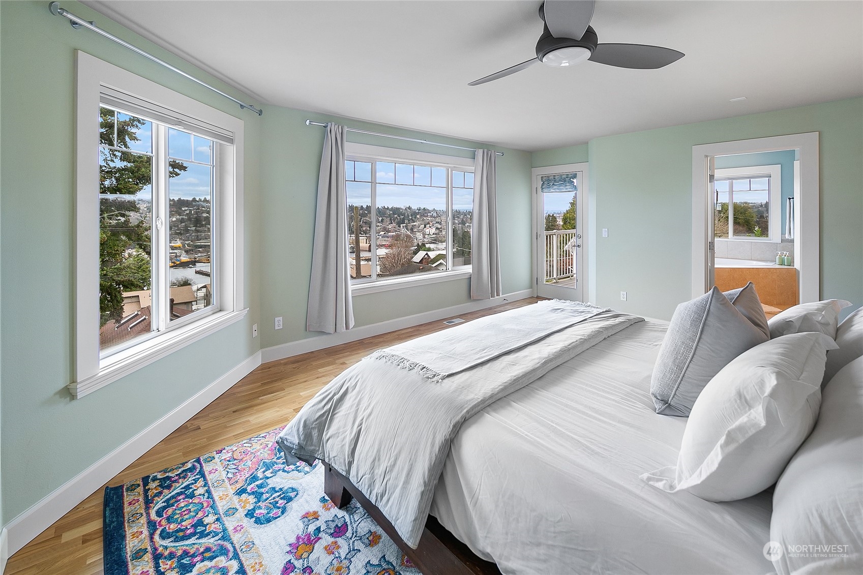 1020 West Ruffner Street Seattle, WA 98119 - Photo 19 of 39 a bedroom with a bed and a window