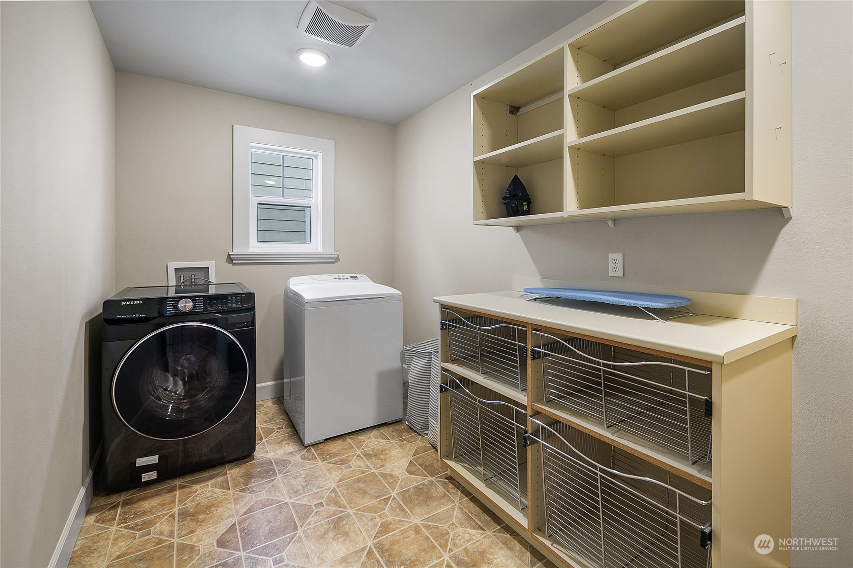 1020 West Ruffner Street Seattle, WA 98119 - Photo 23 of 39 a utility room with sink dryer and washer