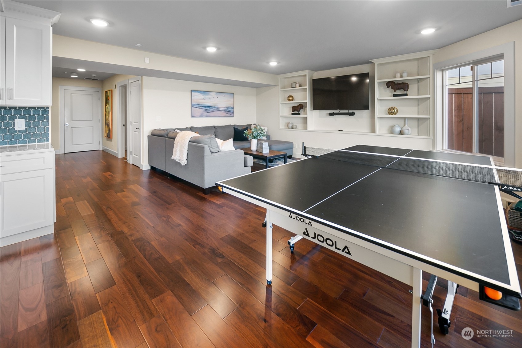 1020 West Ruffner Street Seattle, WA 98119 - Photo 25 of 39 a living room with stainless steel appliances furniture and a flat screen tv