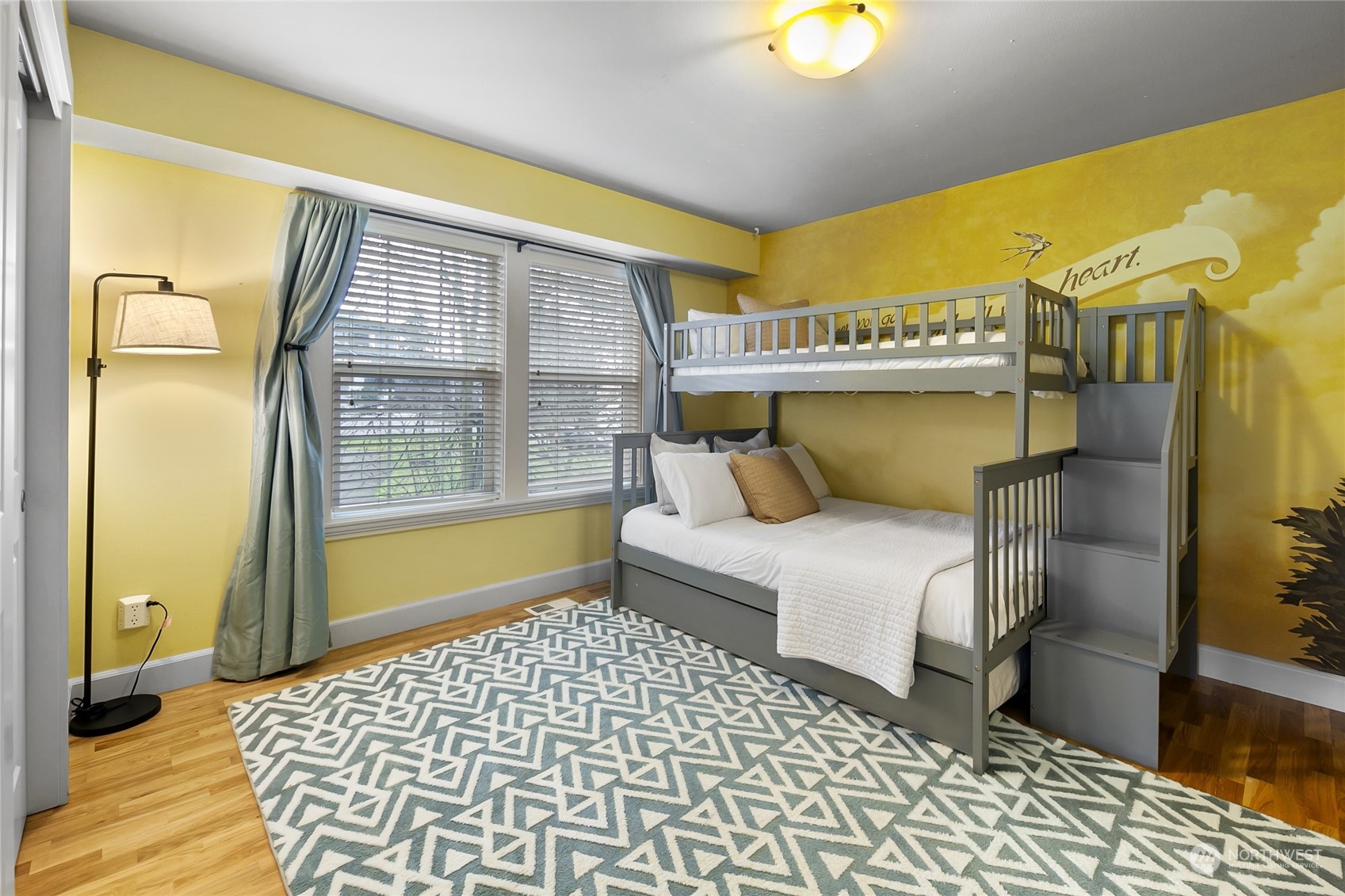 1020 West Ruffner Street Seattle, WA 98119 - Photo 34 of 39 a bedroom with a bed and a window