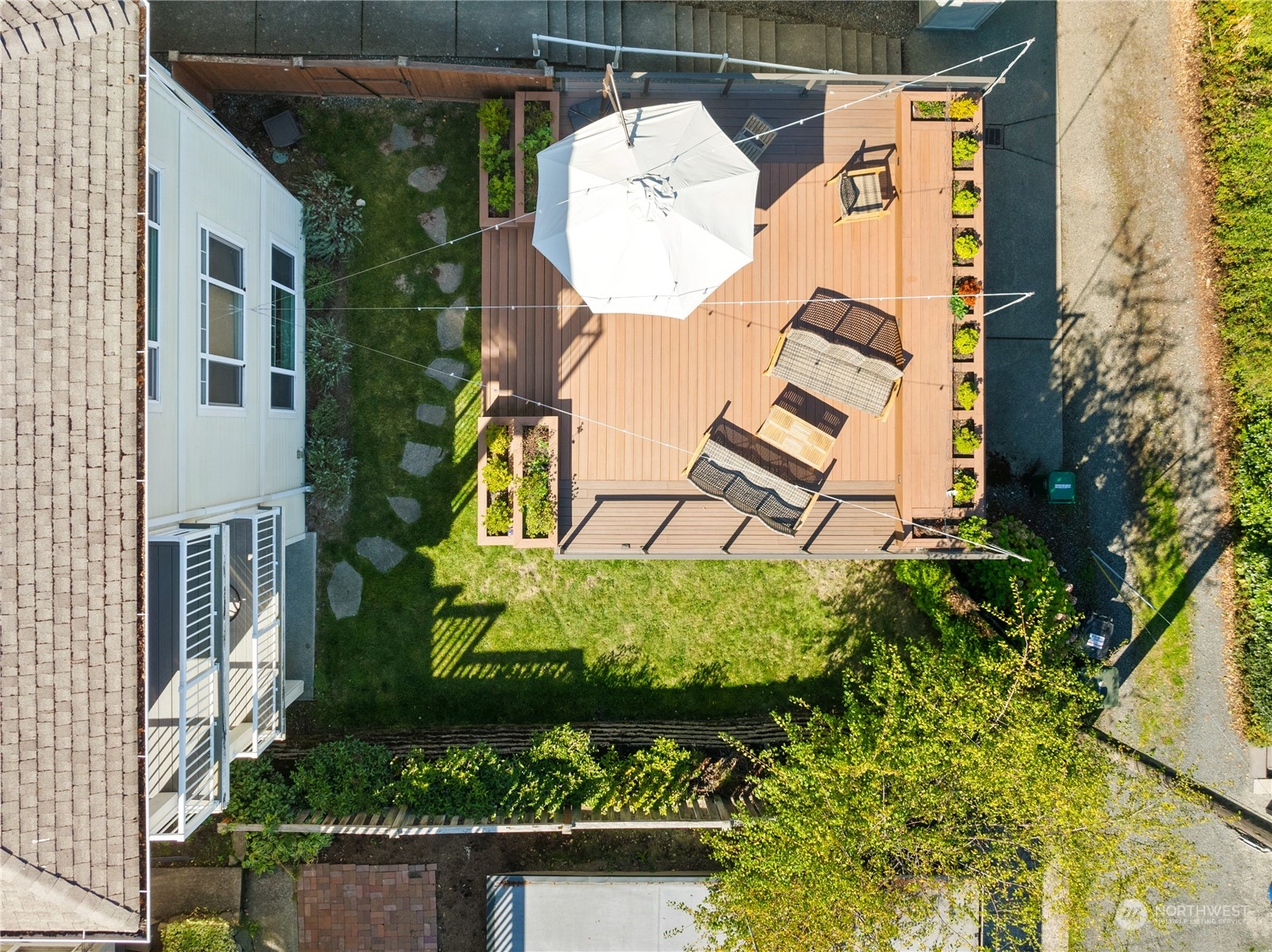 1020 West Ruffner Street Seattle, WA 98119 - Photo 36 of 39 an aerial view of a house with a yard and potted plants