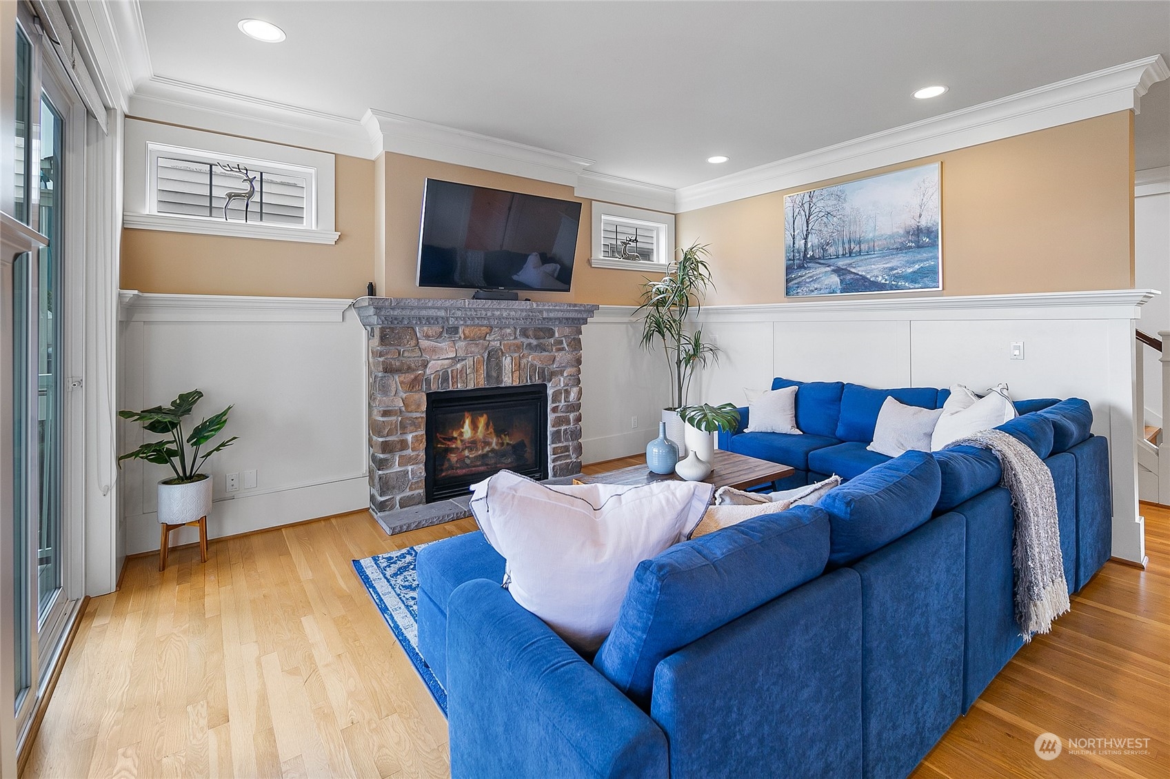 1020 West Ruffner Street Seattle, WA 98119 - Photo 10 of 39 a living room with furniture fireplace and flat screen tv