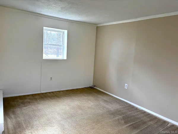 an empty room with a workbench