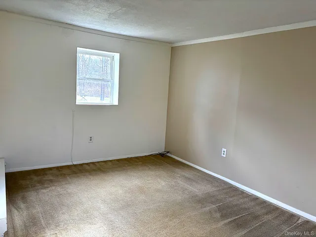 an empty room with a workbench