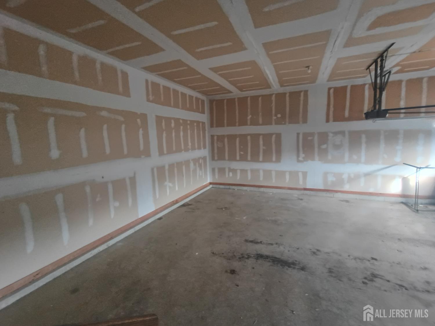 43 Brent Drive Howell, NJ 07731 - Photo 11 of 15 a view of an empty room with a window