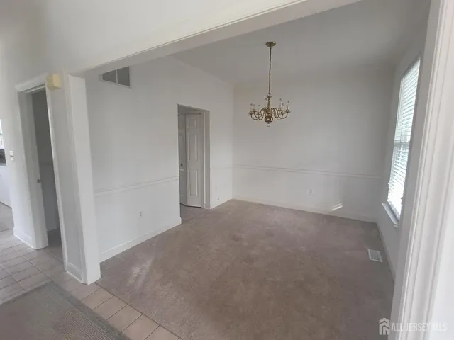 a view of a room with an entryway