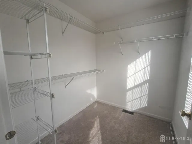 a view of a room with rack on the wall